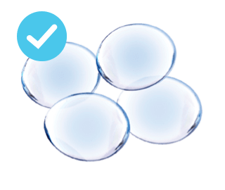 Photo of four used contact lenses